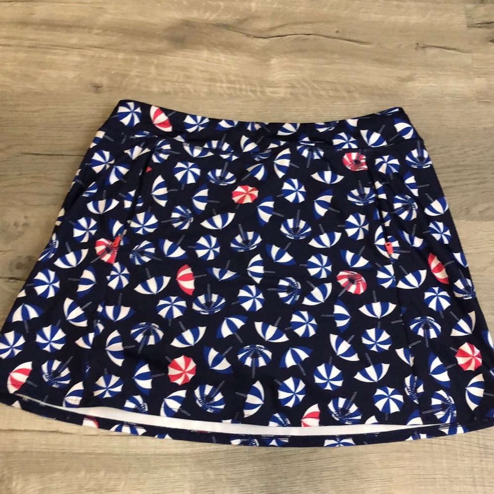 RLX medium womens umbrella golf skort